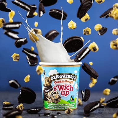 A pint of Cookie Dough S'Wich Up with cookies exploding out of it