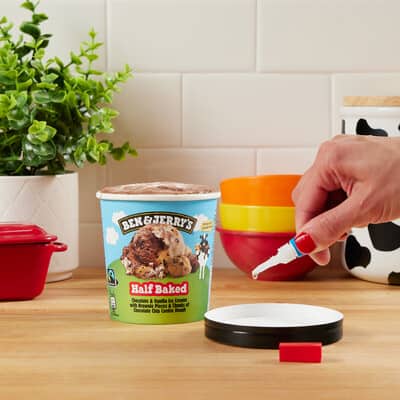Tub of ice cream with being glued with superglue